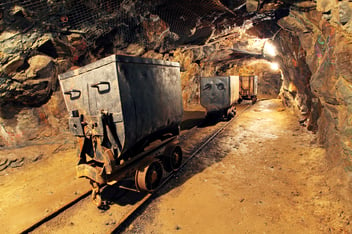 Mining cars in a precious metal mine
